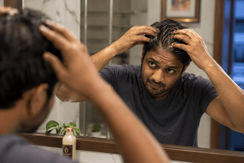 Man in a relaxed hair care ritual